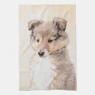 Linge De Cuisine Chiot de chien de berger de Shetland peignant