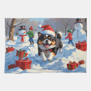 Linge De Cuisine Japanese Chin courant dans la neige avec un chapea