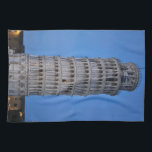 Linge De Cuisine Leaning Tower at Dusk<br><div class="desc">This captivating photograph showcases the iconic Leaning Tower of Pisa standing elegantly against a deep blue twilight sky in Pisa. The historic marble tower, famous for its unmistakable tilt, is beautifully illuminated, highlighting its intricate Romanesque arches and layered columns. The soft evening light creates a striking contrast between the glowing...</div>