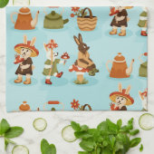 Linge De Cuisine light blue background features cows (Plié)