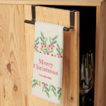 Linge De Cuisine Noël des Feuilles d'aquarelle et des baies<br><div class="desc">Aquarelle élégante de feuilles verts et de baies rouges sur un arrière - plan en ivoire,  Joyeux Noël et votre nom de famille en lettrage chic,  cette serviette de cuisine est un bel ajout à votre décor de Noël. CORRESPONDANCE d'objets dans notre collection.</div>