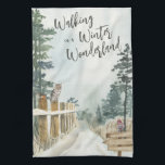 Linge De Cuisine Paysage hivernal Marche dans un pays d'hiver<br><div class="desc">Serviette de cuisine Winter Landscape,  avec l'inscription "Walking in a Winter Wonderland" dans la typographie de scénario tendance. Cette conception rustique de campagne a une scène aquarelle d'un sentier boisé enneigé,  des pins,  un robin et une chouette sur les poteaux de clôture.</div>