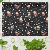 Linge De Cuisine Père Noël de golf sur noir (Plié)