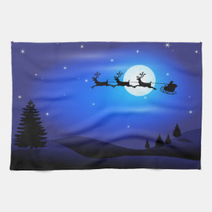 Linge De Cuisine Père Noël et vol de renne à travers le ciel