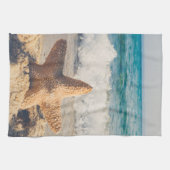 Linge De Cuisine Starfish sur une plage de sable Photo (Horizontal)