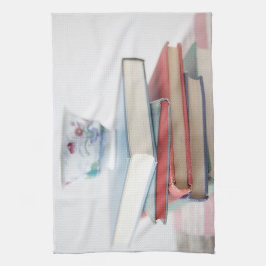 Linge De Cuisine Teacup on book stack (Vertical)