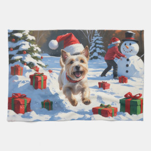 Linge De Cuisine Terrier Cairn courant dans la neige avec un chapea