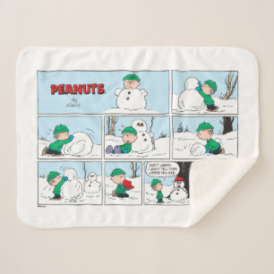 Linus bouwt een sneeuwpop sherpa deken