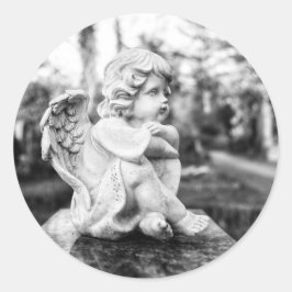 Little angel sitting watching the horizon ronde sticker