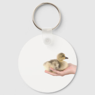 little goose in one hand sleutelhanger