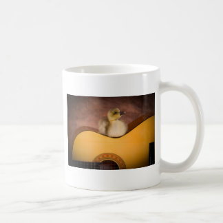 little goose on a guitar koffiemok