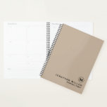 Livre de rendez-vous minimal moderne Monogramme<br><div class="desc">Médaillon de monogramme minimal moderne Nom Titre Texte personnalisé Noir Classic Bloc Typographie Arrière - plan massif Beige Rendez-vous Planificateur de livres</div>
