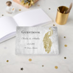 Livre d'or Mariage Peacock<br><div class="desc">Enregistrez les invités à votre grande journée avec un livre d'or Peacock Wedding Day Guestbook. Le design du livre d'or comprend un élégant paon,  un feuillage délicat et un arrière - plan grinçant. Papier à lettres mariage supplémentaire disponible avec cette conception aussi.</div>