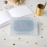 Livre D'or Mariage vintage romantique élégant bleu<br><div class="desc">Conception fleurie vintage élégante de cadre en crème sur le livre d'arrière - plan,  romantique et sophistiqué,  grand bleu poussiéreux mou de mariage d'invité pour le mariage vintage,  le mariage romantique,  et le mariage d'hiver.</div>