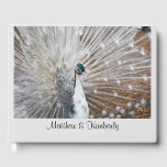 Livre D'or Peacock blanc rare<br><div class="desc">Ce livre d'hôtes présente un beau paon blanc. Fait une déclaration élégante pour un mariage,  un anniversaire ou un fiançailles. Le texte peut être customisé à vos besoins.</div>