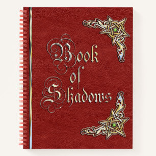 Livre rouge et or des ombres