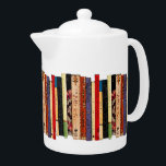Livre Teapot<br><div class="desc">Cette théière en porcelaine blanche de couleur brillante dispose d'une étagère de livres colorés. Ils forment un motif géométrique abstrait intéressant en couleurs vert, brun, jaune, rouge, bleu, noir et rose.</div>