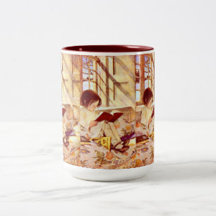 Livres d'images dans la tasse d'hiver