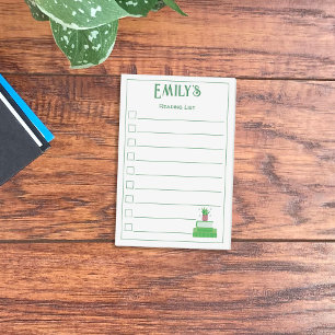 Livres verts et Post-It de liste de lecture de pla