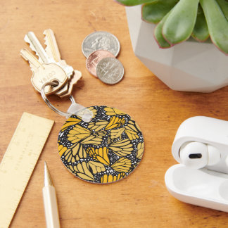 Llavero circular estampado mariposa monarca sleutelhanger