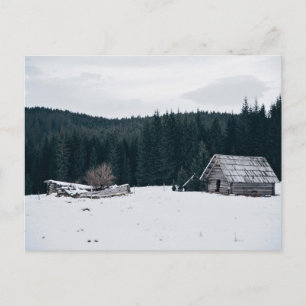 Logcabine in de sneeuw briefkaart