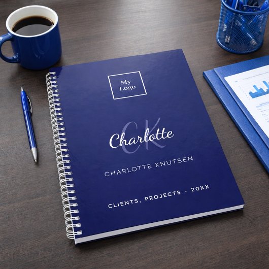 logo commercial bleu marine monogramme blanc