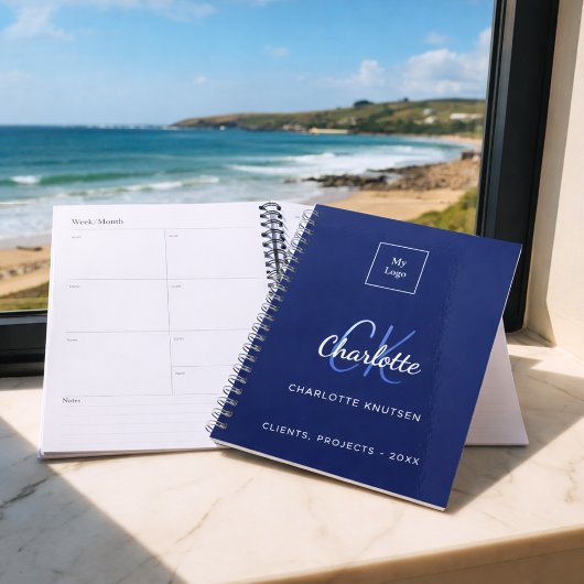 logo commercial bleu marine monogramme blanc