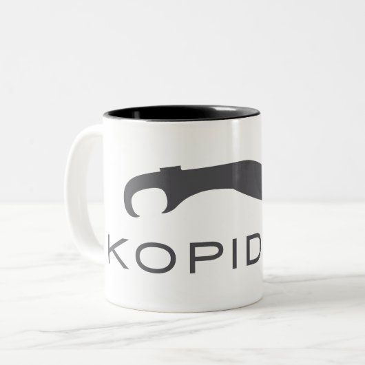 Logo de l'épée Kopidion tasse à café (Devant gauche)