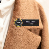 Logo, gouden accent, zwarte naamplaatje