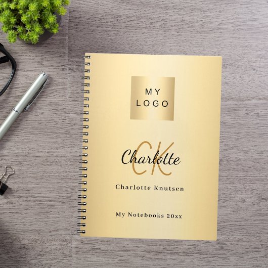 Logo gouden monogram moderne zaken notitieboek