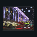 Londres la nuit Carte postale<br><div class="desc">Londres la nuit. Longue photo d'un bus floue qui passe la nuit dans la rue.</div>