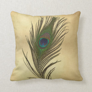 look-peacock-doether op goud kussen