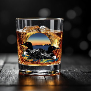 Loon paar zonsondergang blauw whisky glas