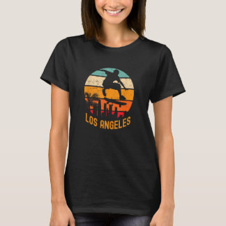 Los Angeles met skateboarder vliegen boven met re T-shirt