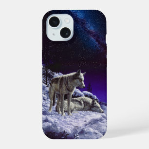 Loups gris dans la neige hivernale la nuit