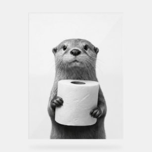 Loutre stoïque tenant un rouleau de papier toilett