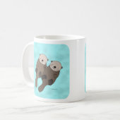 Loutre tenant la tasse mignonne de couples de (Devant gauche)