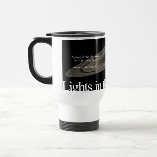 Lumières dans la tasse foncée de voyage (Gauche)