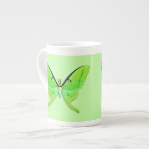Luna moth op een bleke groene achtergrond porselein kop
