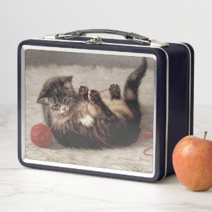 Lunch Box Berceau de chat, un chat jouant avec une pelote de