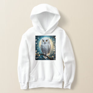 Lune vigilante : Le hibou blanc des neiges