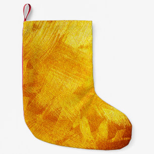 Luxe gouden textuur, abstracte achtergrond. kleine kerstsok