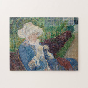 Lydia Crocheting in de tuin bij Marly Legpuzzel