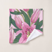 Lys fleuris dans la couverture de duvet rose paste (Gant de toilette)
