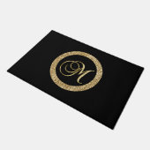 M gouden monogram op zwart deurmat (Schuin)