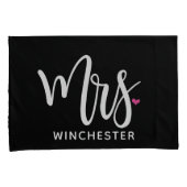 M. noir + Mme (nom) a personnalisé des taies (devant-Droit)