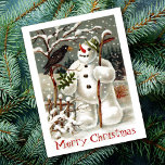 M. Snowman et M. Crow Carte postale<br><div class="desc">Cette magnifique carte postale allemande illustre un corbeau qui visite un bonhomme de neige entouré de paysages hivernaux. La simplicité et les couleurs donnent une belle image accrocheuse. Il est parfait pour tous vos besoins de Noël et de vacances.</div>