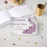 Magenta Peacock Leaf Vine Mariage Livre d'or<br><div class="desc">Enregistrez les invités à votre grande journée avec un livre d'or Magenta Peacock Leaf Vine Wedding Day. Le design du livre d'or est orné d'un arrière - plan gris clair avec un paon magenta vibrant orné d'un embellissement de vigne en feuilles. Papier à lettres mariage supplémentaire disponible avec cette conception...</div>