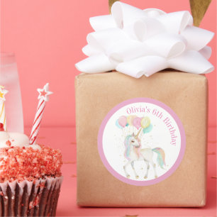 Magische eenhoorn met regenboogballonnen ronde sticker