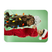 Magnet Flexible Jeune garçon enveloppant les lumières de Noël auto (Horizontal)